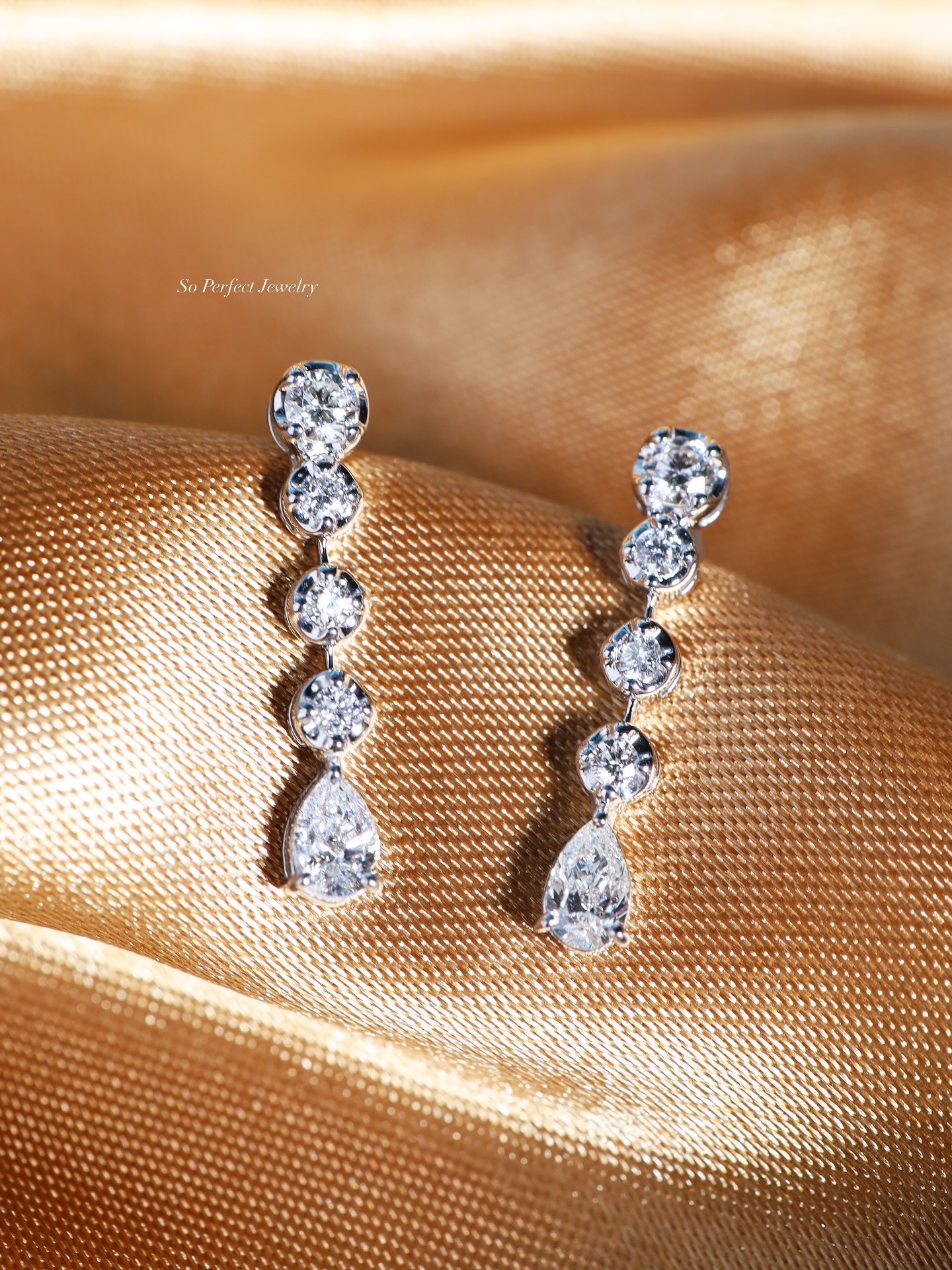 1.10 Carat Pear and Round Diamond Drop Earrings in 18K White Gold