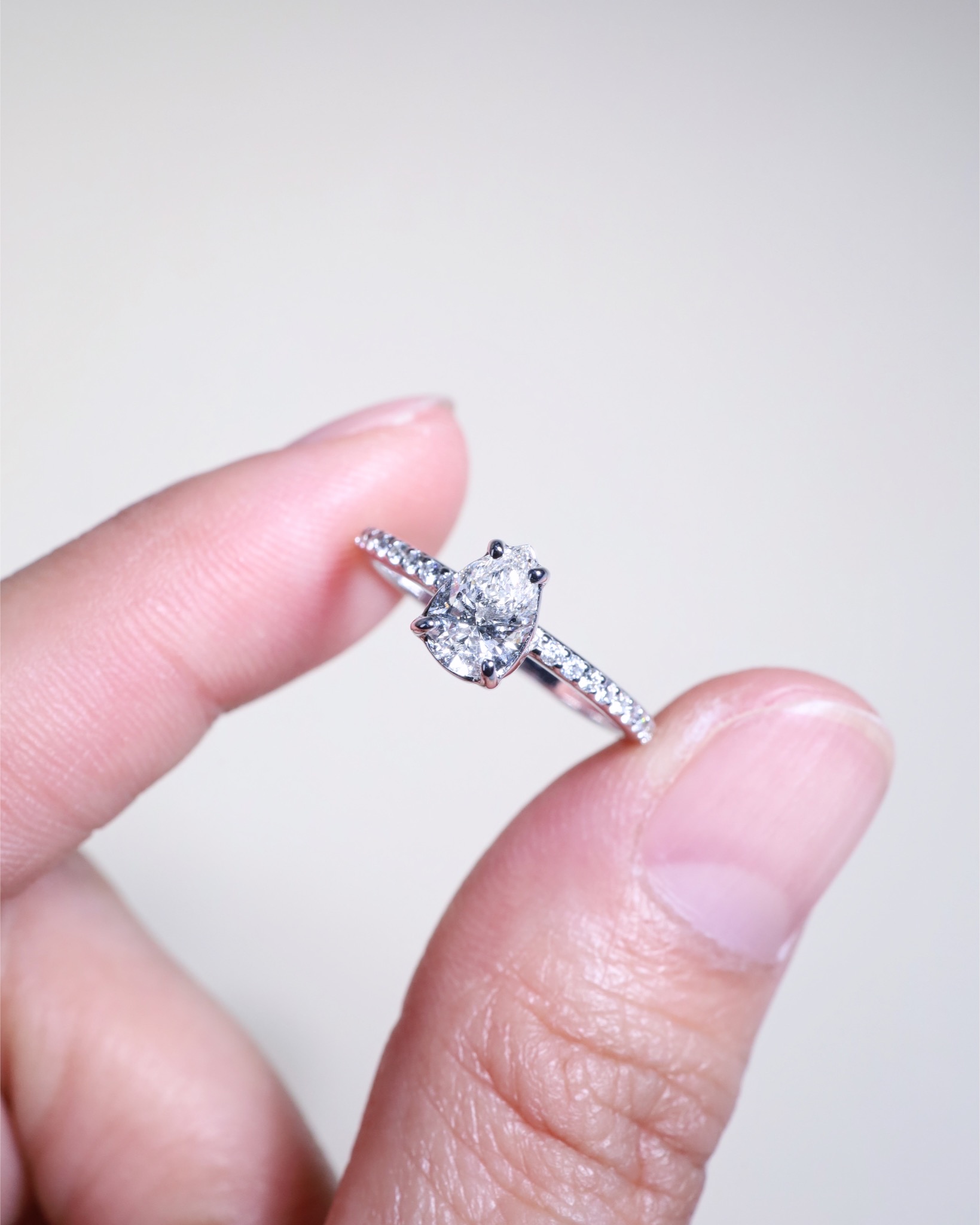 GIA-Certified 0.60 Carat Pear-Shaped Diamond Solitaire Ring in 18K White Gold - Image 10