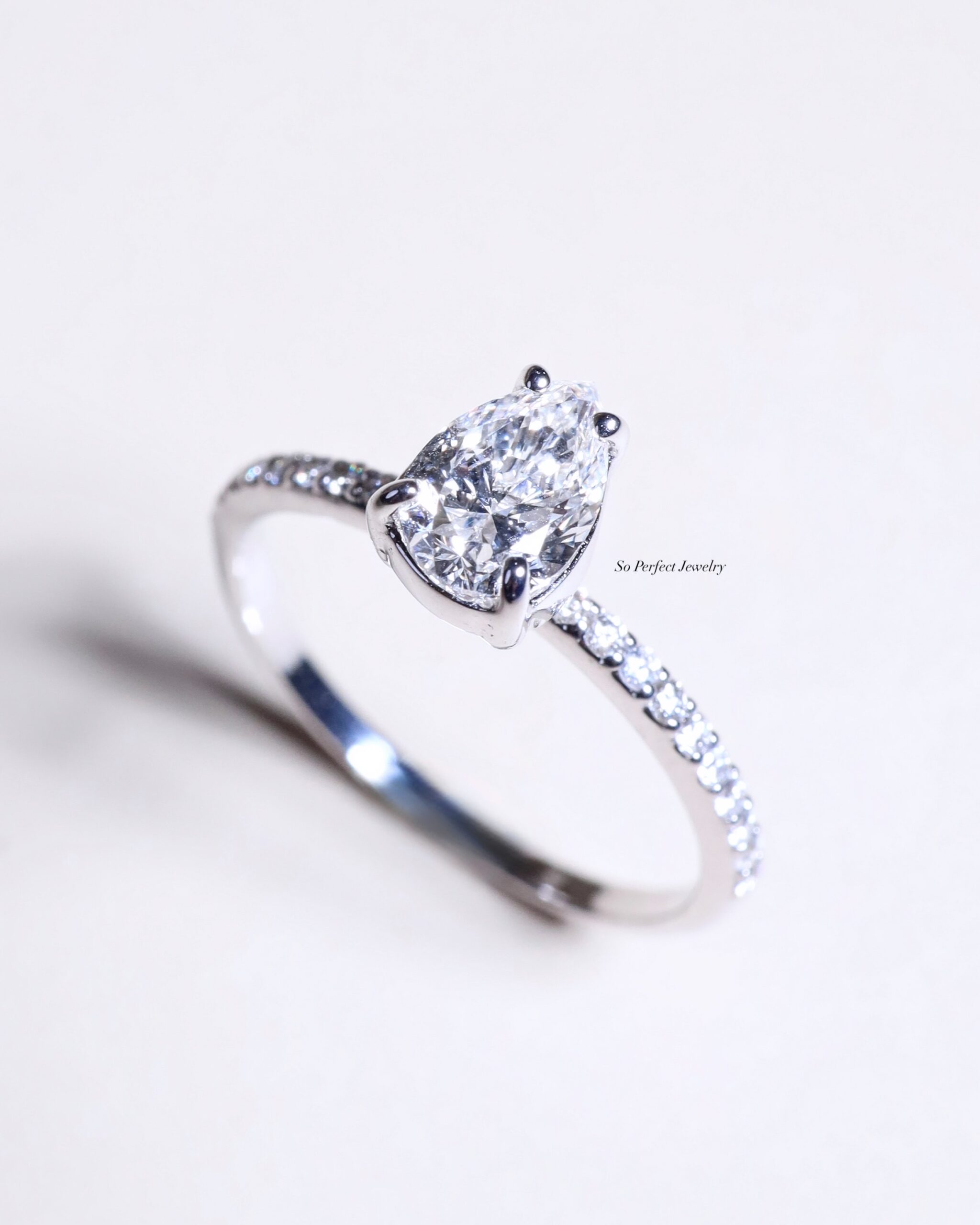 GIA-Certified 0.60 Carat Pear-Shaped Diamond Solitaire Ring in 18K White Gold