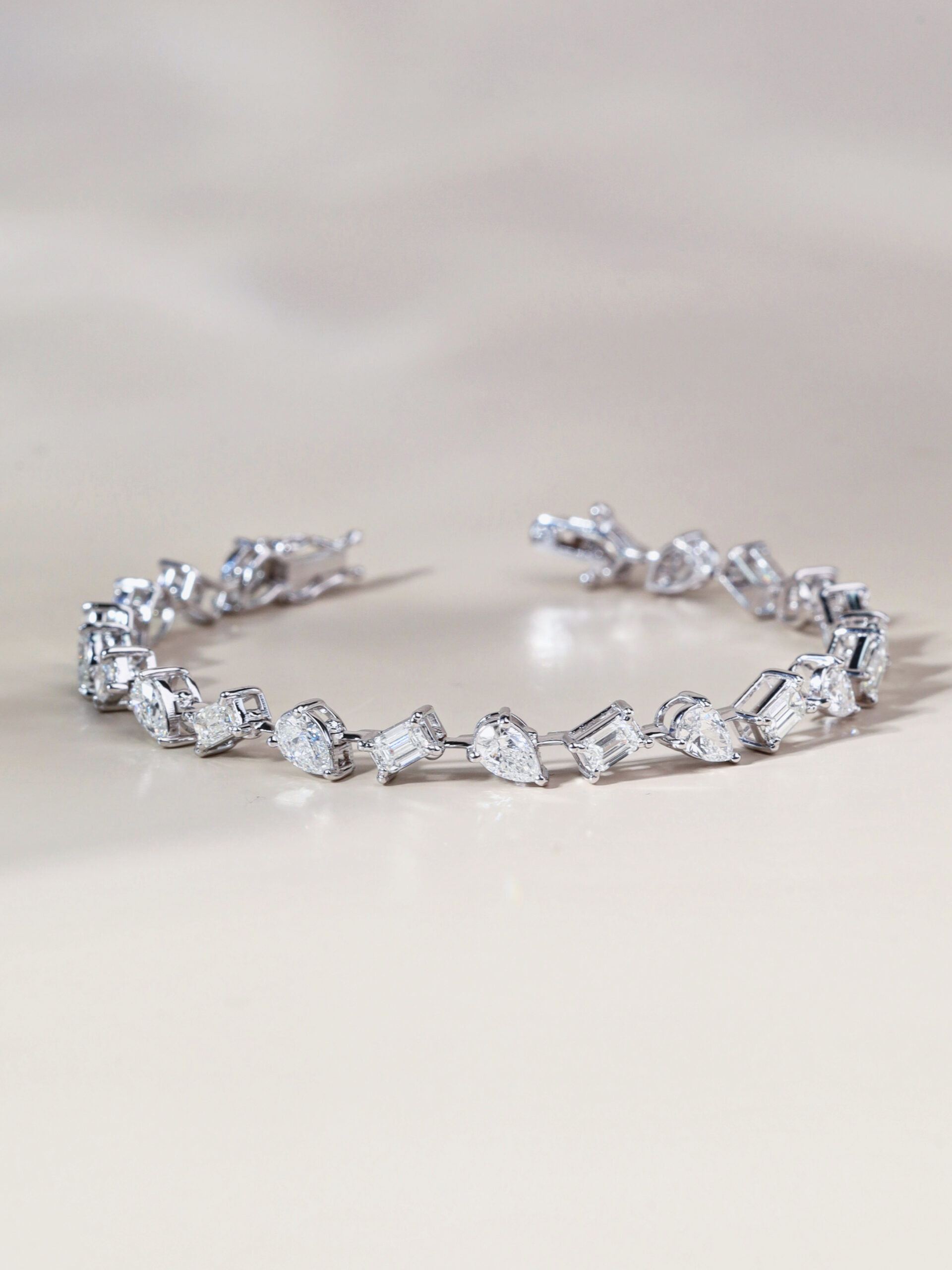 6.13 Carat Pear and Emerald-Cut Diamond Bracelet in 18K White Gold