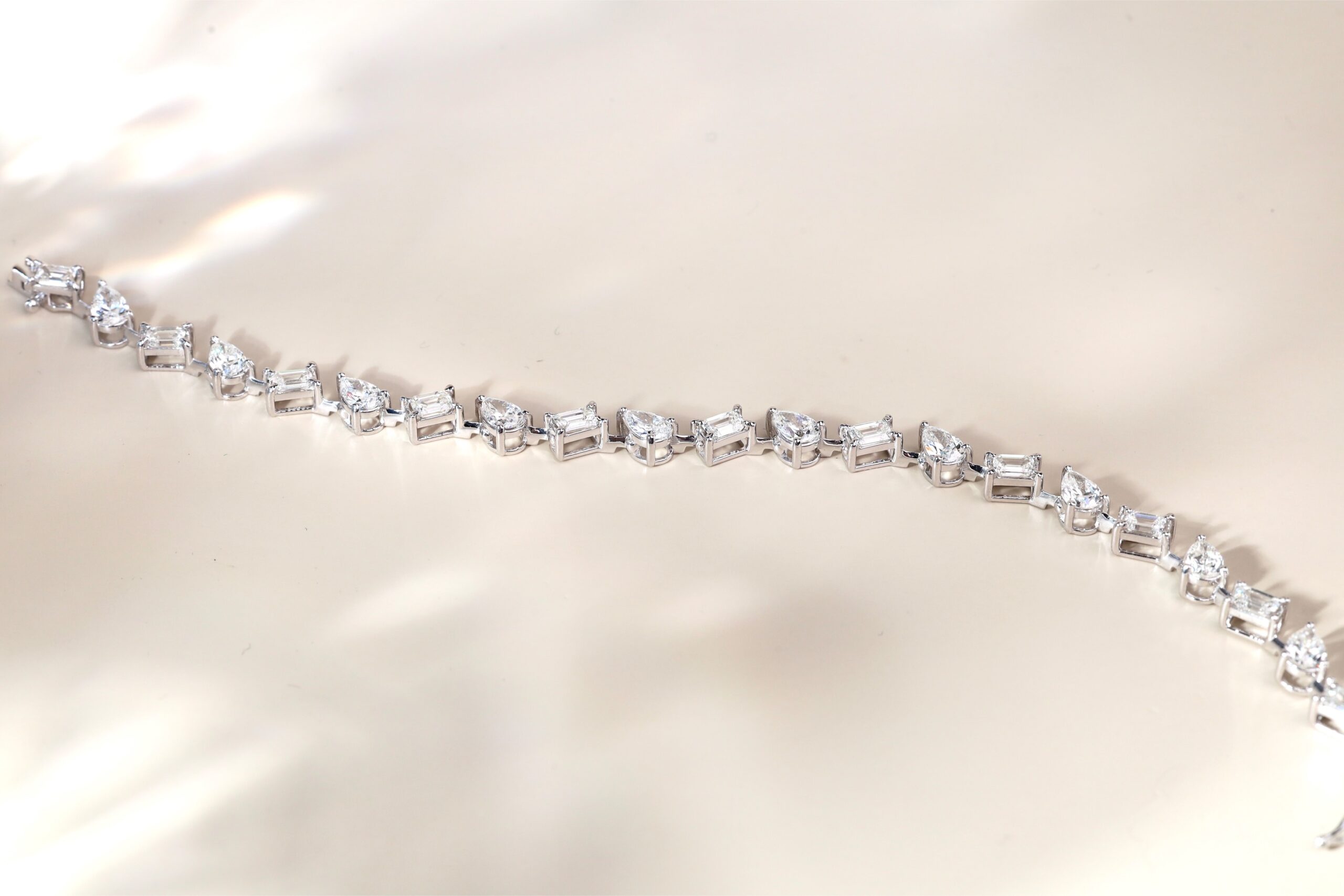 6.13 Carat Pear and Emerald-Cut Diamond Bracelet in 18K White Gold - Image 4